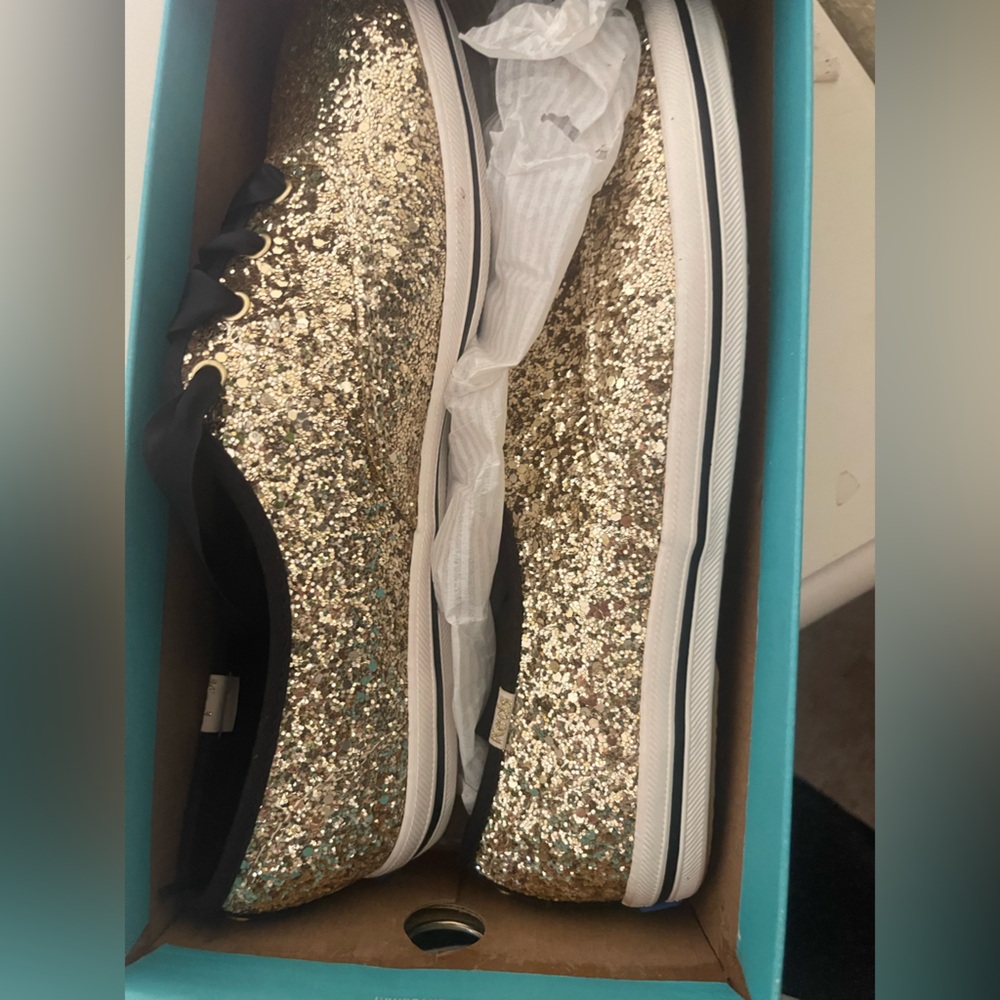 Kate Spade Gold Glitter Sneakers
NEVER WORN 
BRAND NEW 
BOX INCLUDED
